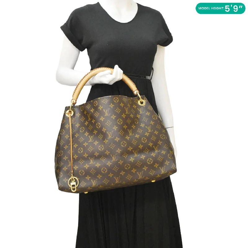 Ladies' dumpling bag store display -LOUIS VUITTON  Artsy MM Monogram Canvas Hobo Bag Brown